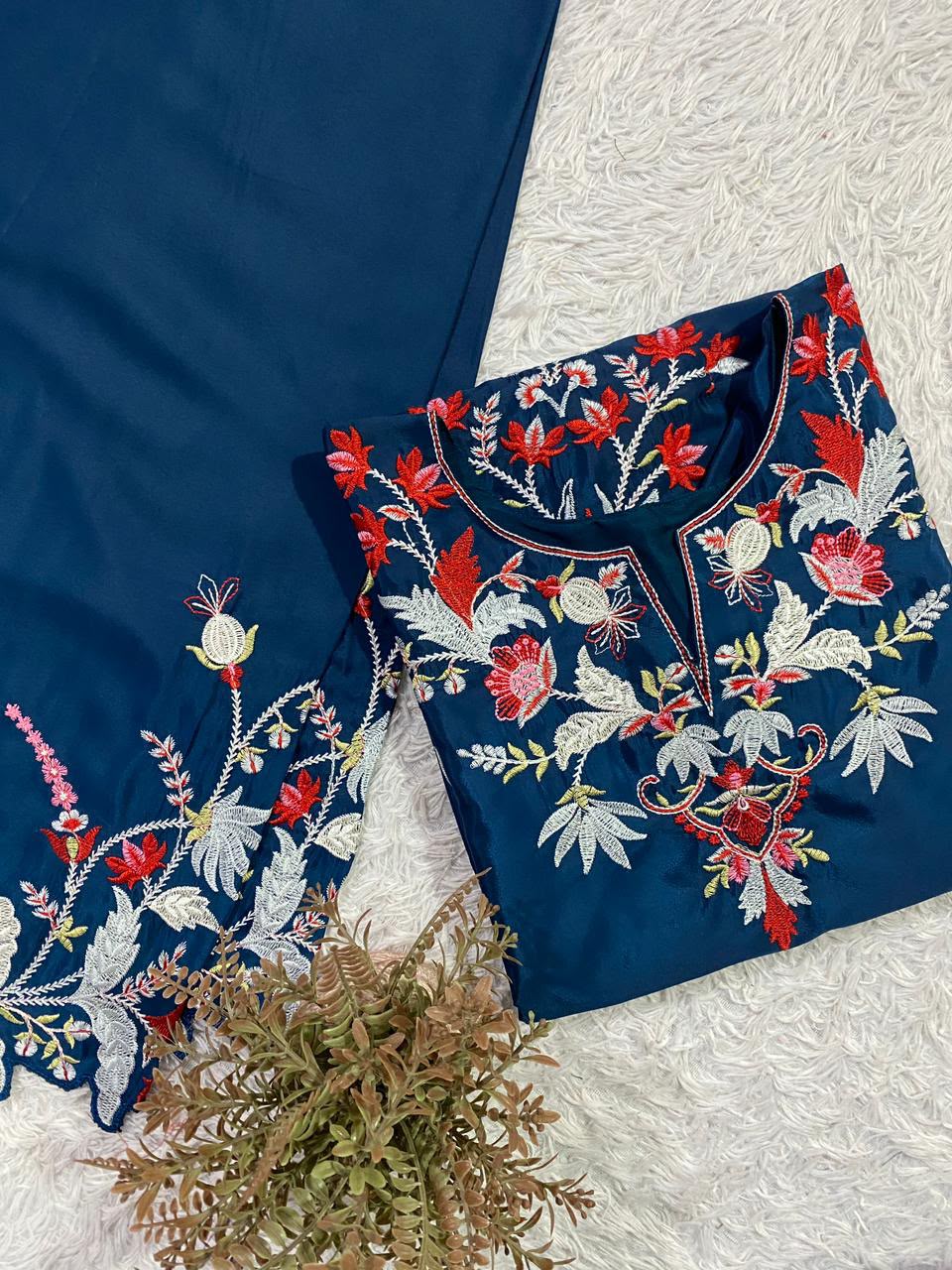 Side profile presentation of thirty-six inch blue French crape top showing comfortable micro inner lining - WishTown Fashion Club