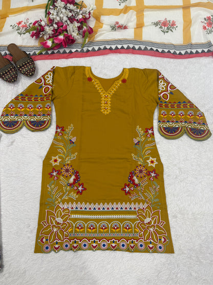 Back angle view of mustard yellow designer top plazzo set displaying clean stitching and tailored fit - WishTown Fashion Club