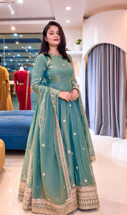 Side profile presentation of sea green fendy silk gown showing full sleeves and comfortable heavy micro cotton inner lining - WishTown Fashion Club