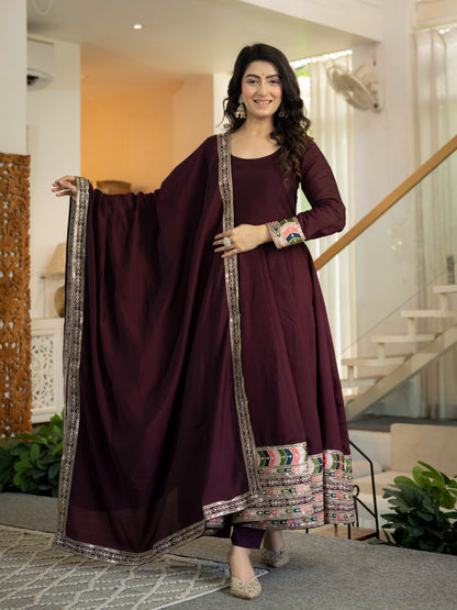 Front view of full three piece wine designer anarkali suit in fancy style with sequence work and roman silk dupatta - WishTown Fashion Club