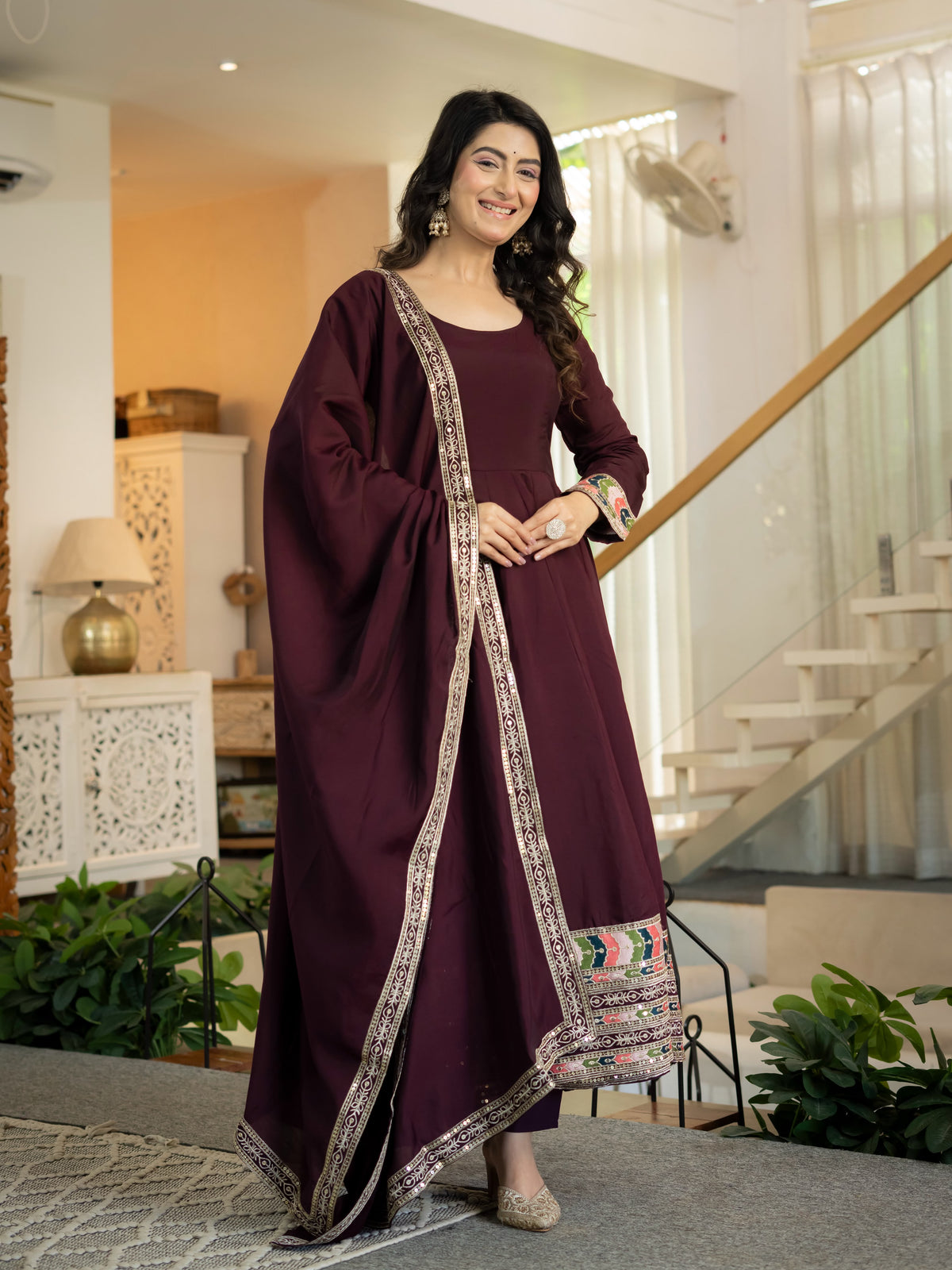 Close up view of intricate 5mm sequence work and detailed embroidery on wine heavy roman silk anarkali yoke - WishTown Fashion Club