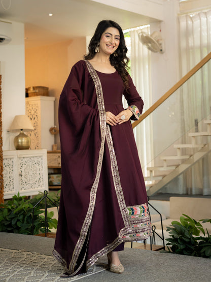 Close up view of intricate 5mm sequence work and detailed embroidery on wine heavy roman silk anarkali yoke - WishTown Fashion Club