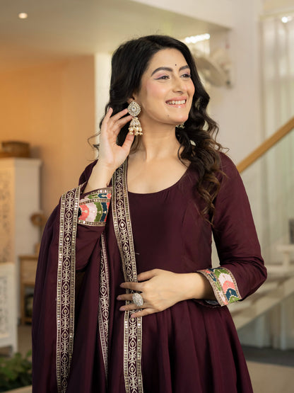 Wide angle shot highlighting three point eighty meter flair and twirl movement of wine roman silk anarkali skirt - WishTown Fashion Club
