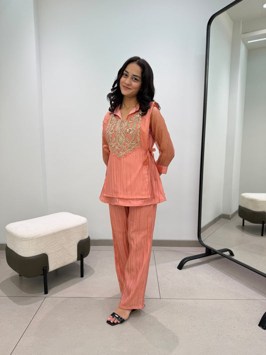 Front view of complete three piece peach beads embroidered co ord set displaying top pant and shrug - WishTown Fashion Club