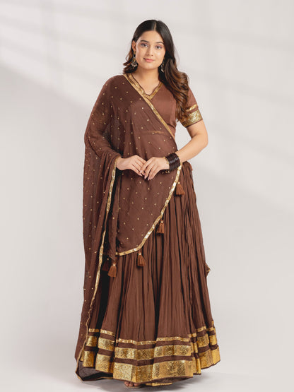 Close up view of traditional gotta patti work detailing on chocolate brown mul chanderi blouse yoke - WishTown Fashion Club