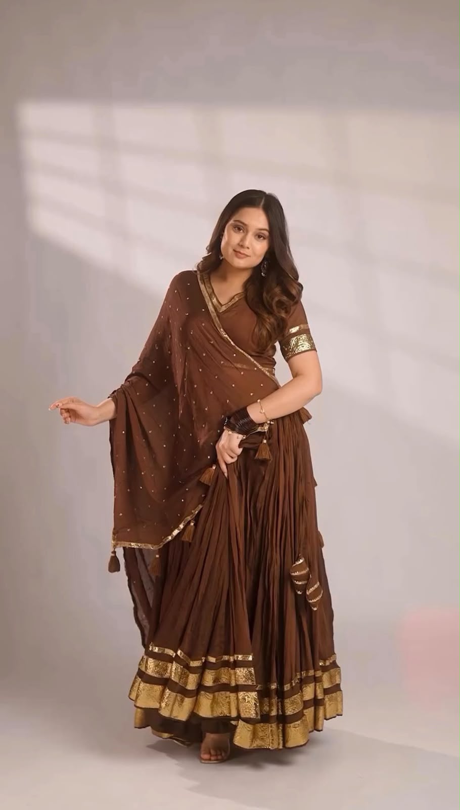 Full length shot of chocolate brown mul chanderi lehenga showing forty-two inch height and gotta patti lace border - WishTown Fashion Club
