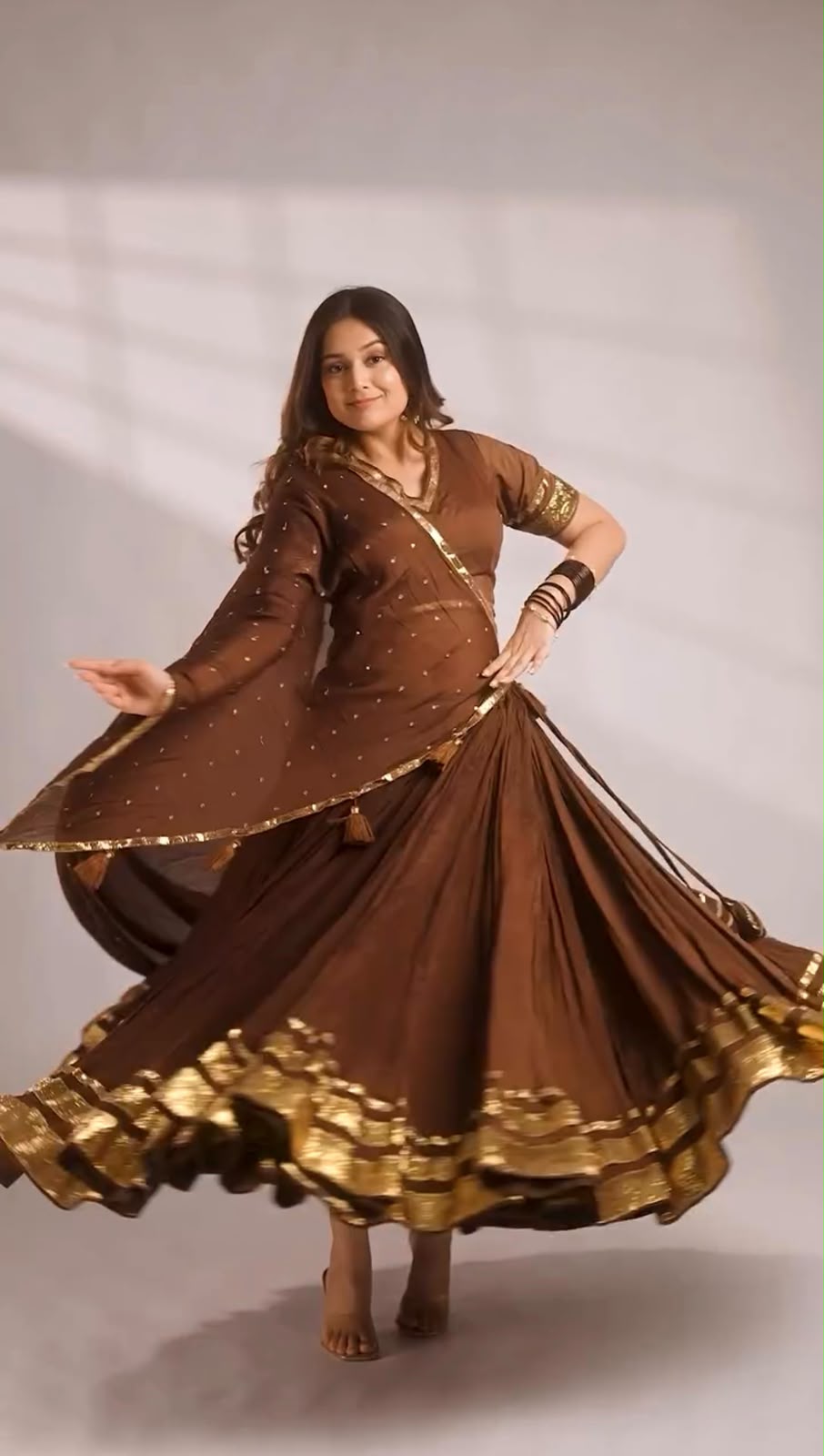 Front view of full chocolate brown designer lehenga choli with gotta patti work and sequence embroidery dupatta - WishTown Fashion Club