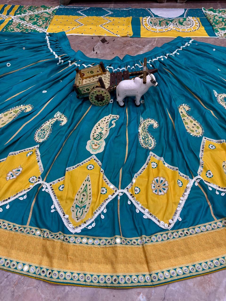 Flat lay display of complete deep cyan lehenga set showing skirt unstitched blouse piece and two point three meter dupatta - WishTown Fashion Club