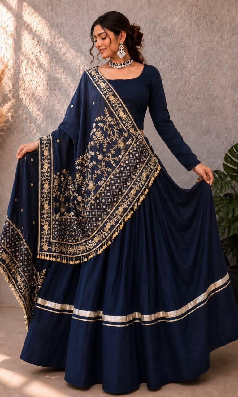 Close up view of real mirror work and gota patti lace detail on navy rayon lehenga skirt - WishTown Fashion Club