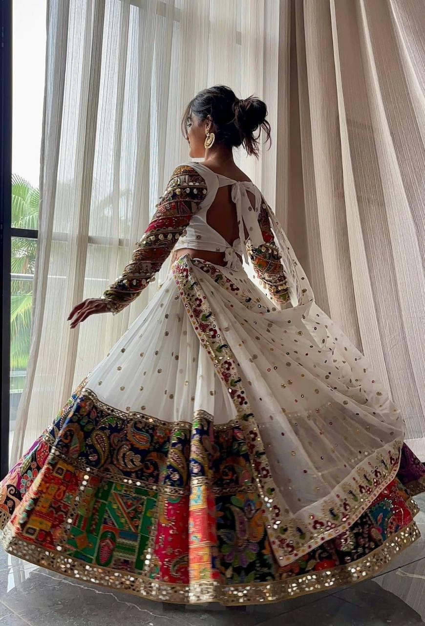 Back angle presentation of white premium muslin silk digital print lehenga showing clean hemline finishing - WishTown Fashion Club