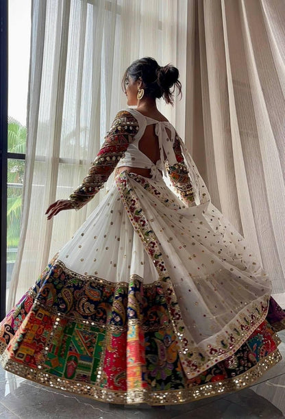 Back angle presentation of white premium muslin silk digital print lehenga showing clean hemline finishing - WishTown Fashion Club