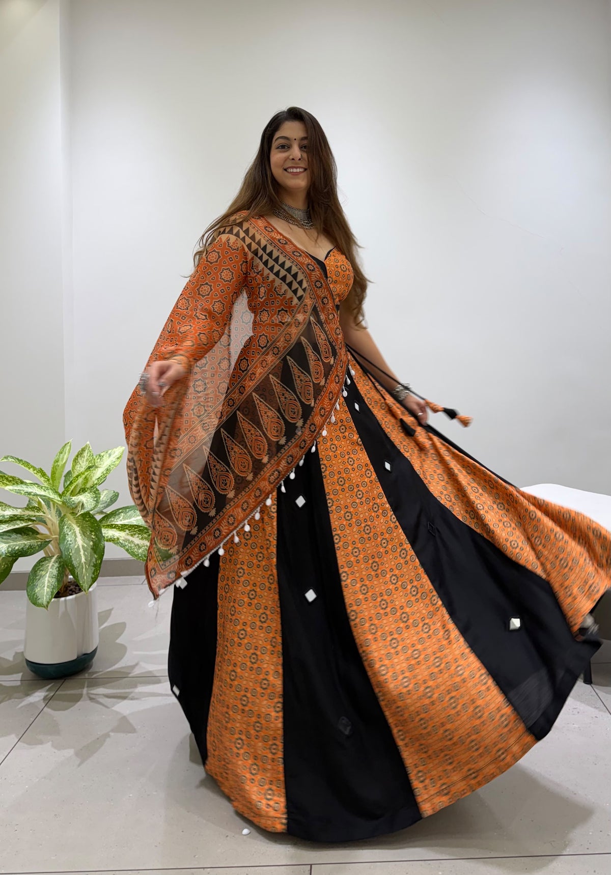 Side profile presentation of multi-colour 1 printed rayon lehenga showing four meter full flair - WishTown Fashion Club