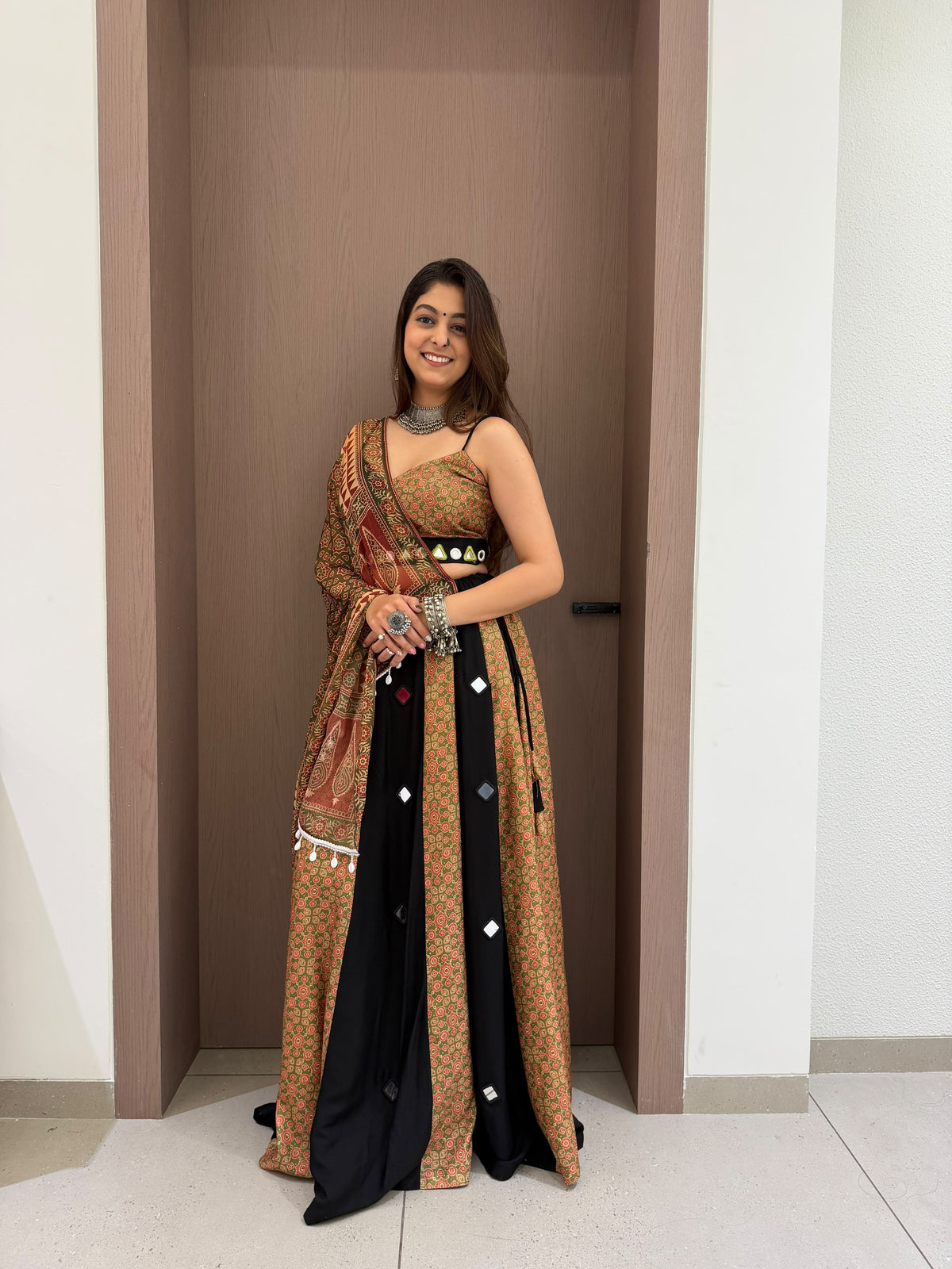 Front view of multi-colour 3 loomeera printed rayon mirror lehenga choli with printed mul dupatta - WishTown Fashion Club