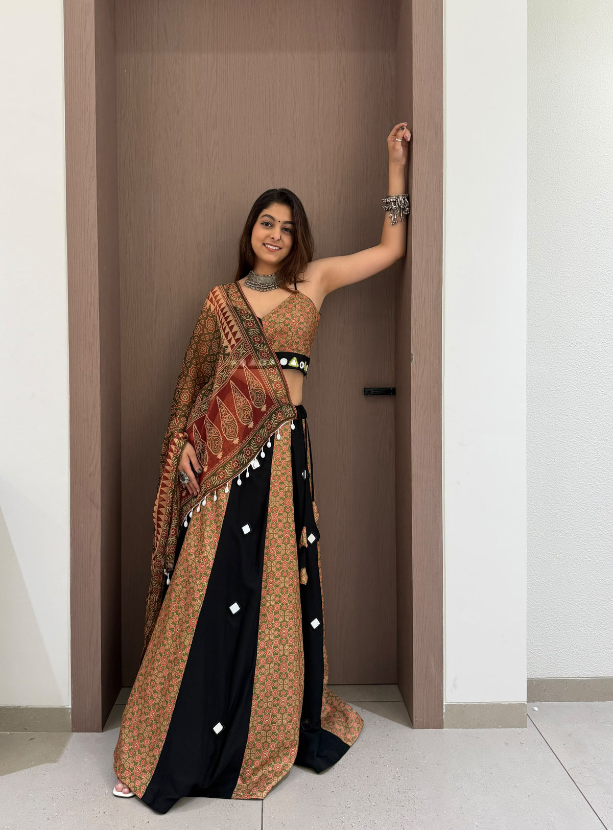Side profile presentation of multi-colour 3 printed rayon lehenga displaying four meter full flair - WishTown Fashion Club
