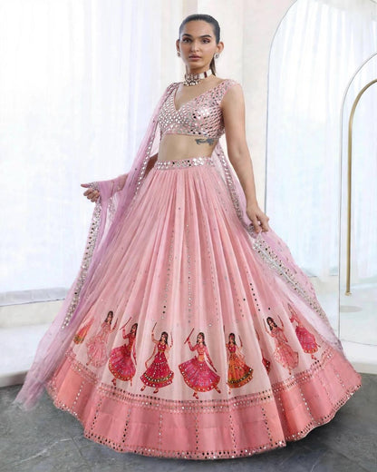 Close up view of detailed digital print patterns and real mirror work on peach pink star georgette fabric - WishTown Fashion Club
