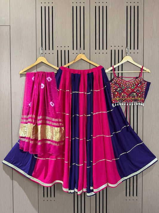 Front view of dark pink rayon real mirror bandhani lehenga choli with traditional bandhani dupatta - WishTown Fashion Club
