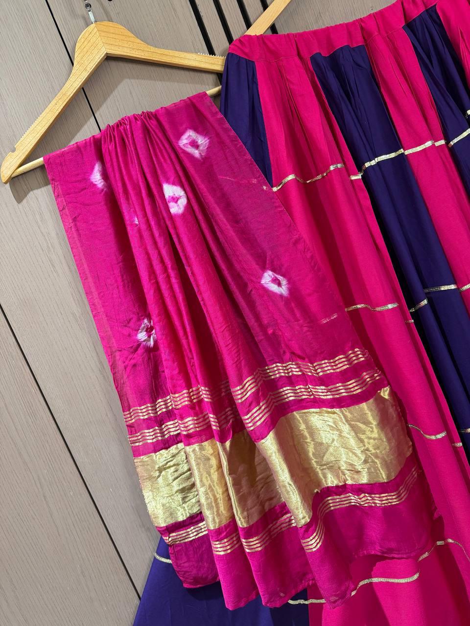 Side profile presentation of dark pink rayon lehenga showing six meter pleated full flair - WishTown Fashion Club