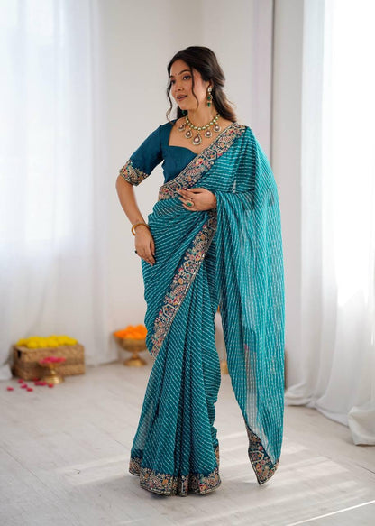 Front view of real model wearing peacock blue faux georgette bandhani sequins saree with embroidered silk blouse - WishTown Fashion Club