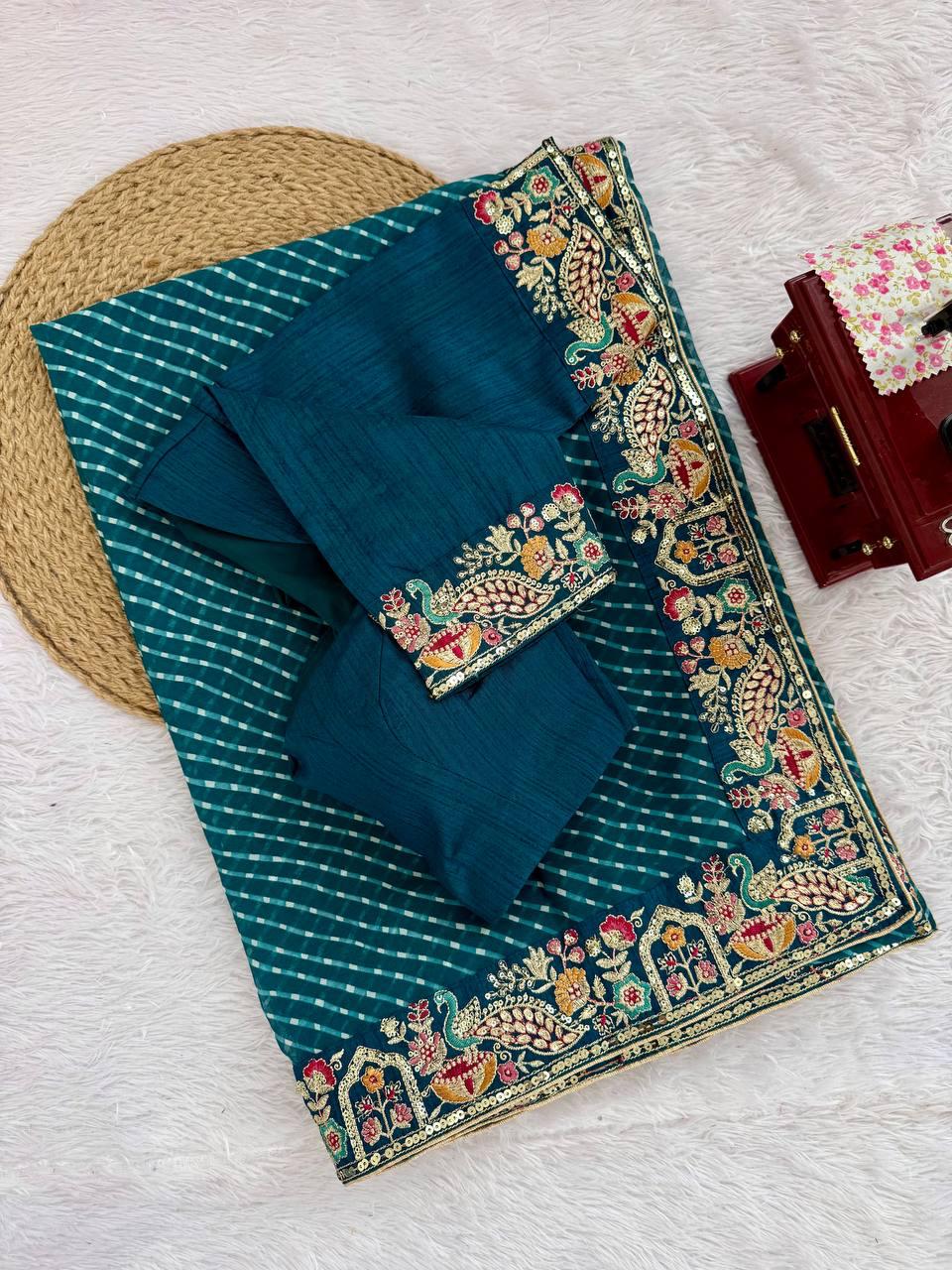 Full length shot of real model demonstrating five point five meter length and structured pleating of peacock blue saree - WishTown Fashion Club