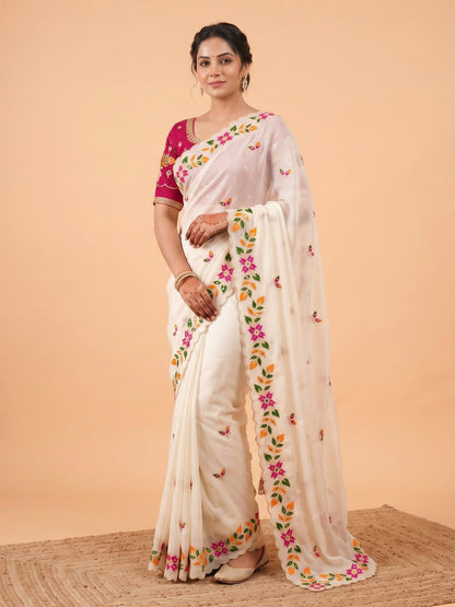 Front view of full white shining georgette diamond work saree paired with contrast embroidery blouse piece - WishTown Fashion Club