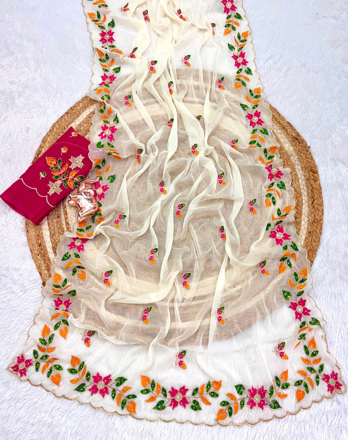 Side profile presentation of white georgette saree showing elegant sheen and lightweight fabric drape - WishTown Fashion Club