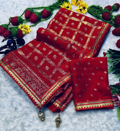 Front view of red premium georgette foil print uniform saree with matching printed blouse - WishTown Fashion Club