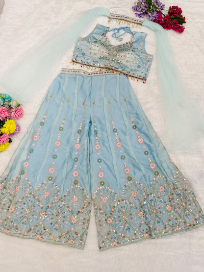 Back angle presentation of sky blue Rangoli silk plazzo blouse set displaying clean stitching and comfortable drape - WishTown Fashion Club