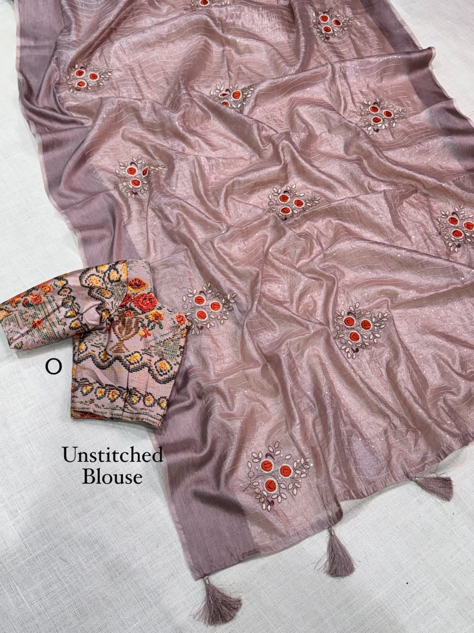 Side profile view of onion pink tissue silk saree showing subtle shine and elegant drape - WishTown Fashion Club
