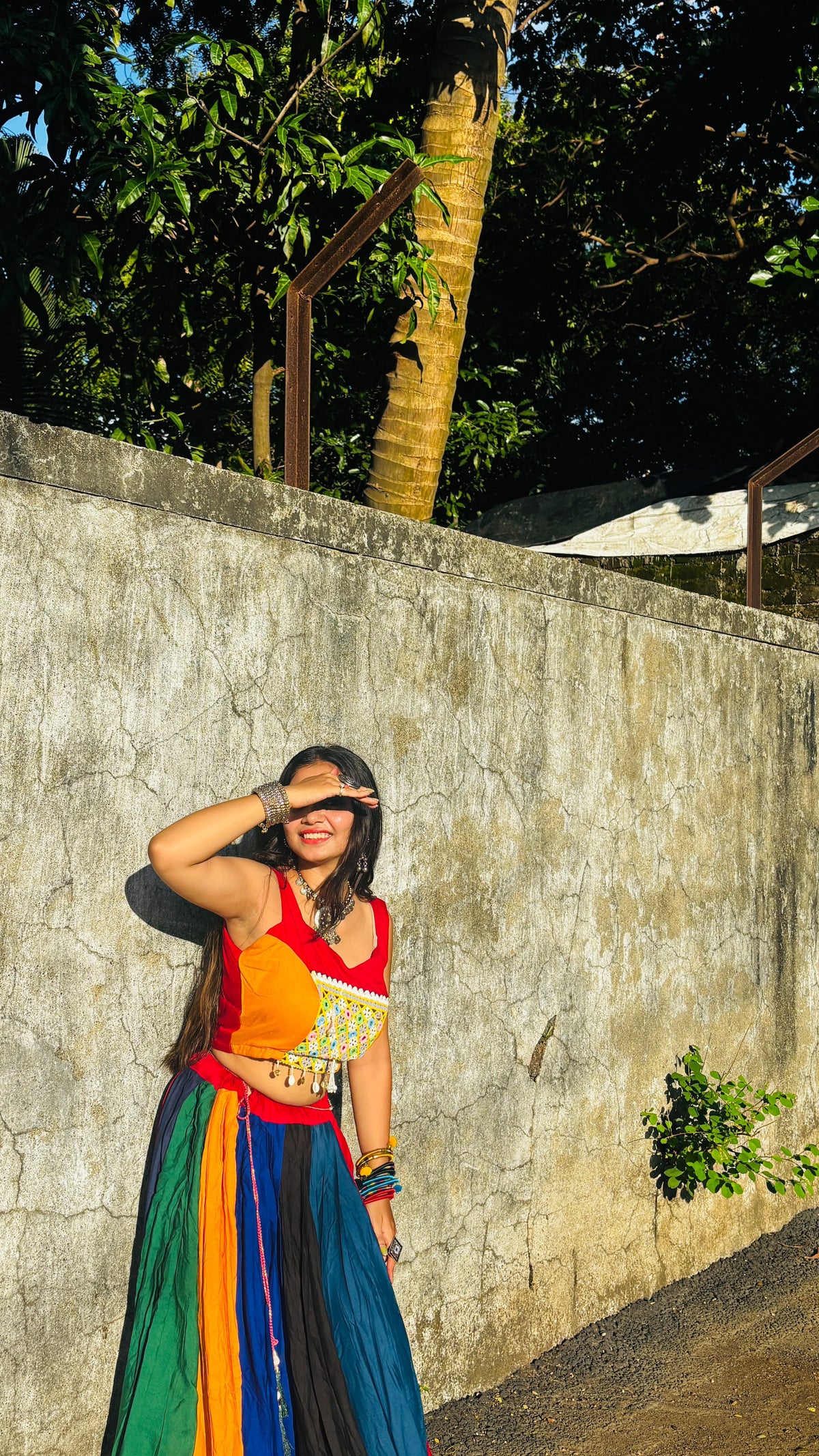 Full length shot of multi colour rayon gotta patti lehenga displaying forty-two inch height and royal drape - WishTown Fashion Club