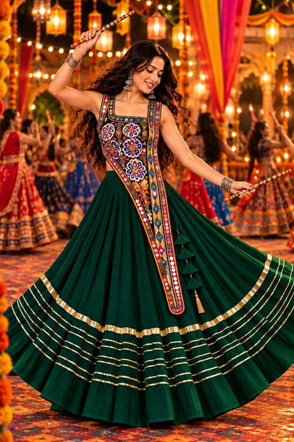 Front view of green rayon cotton heavy lace chaniya choli with matching blouse - WishTown Fashion Club