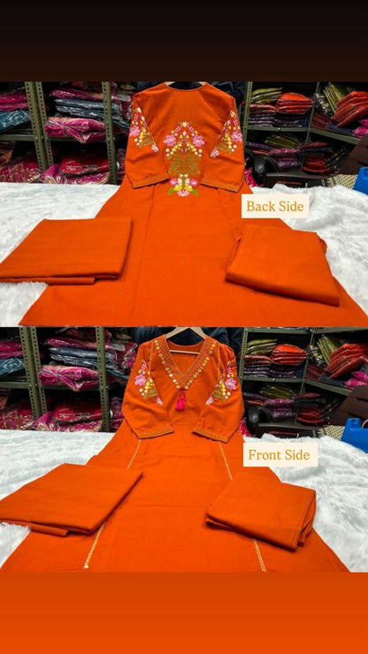 Orange cotton suit set back view with embroidered upper back and sleeves - WishTown Fashion Club
