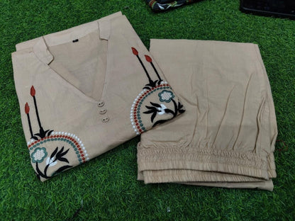 Women off white cotton co ord set with rich heavy embroidery detailing - WishTown Fashion Club