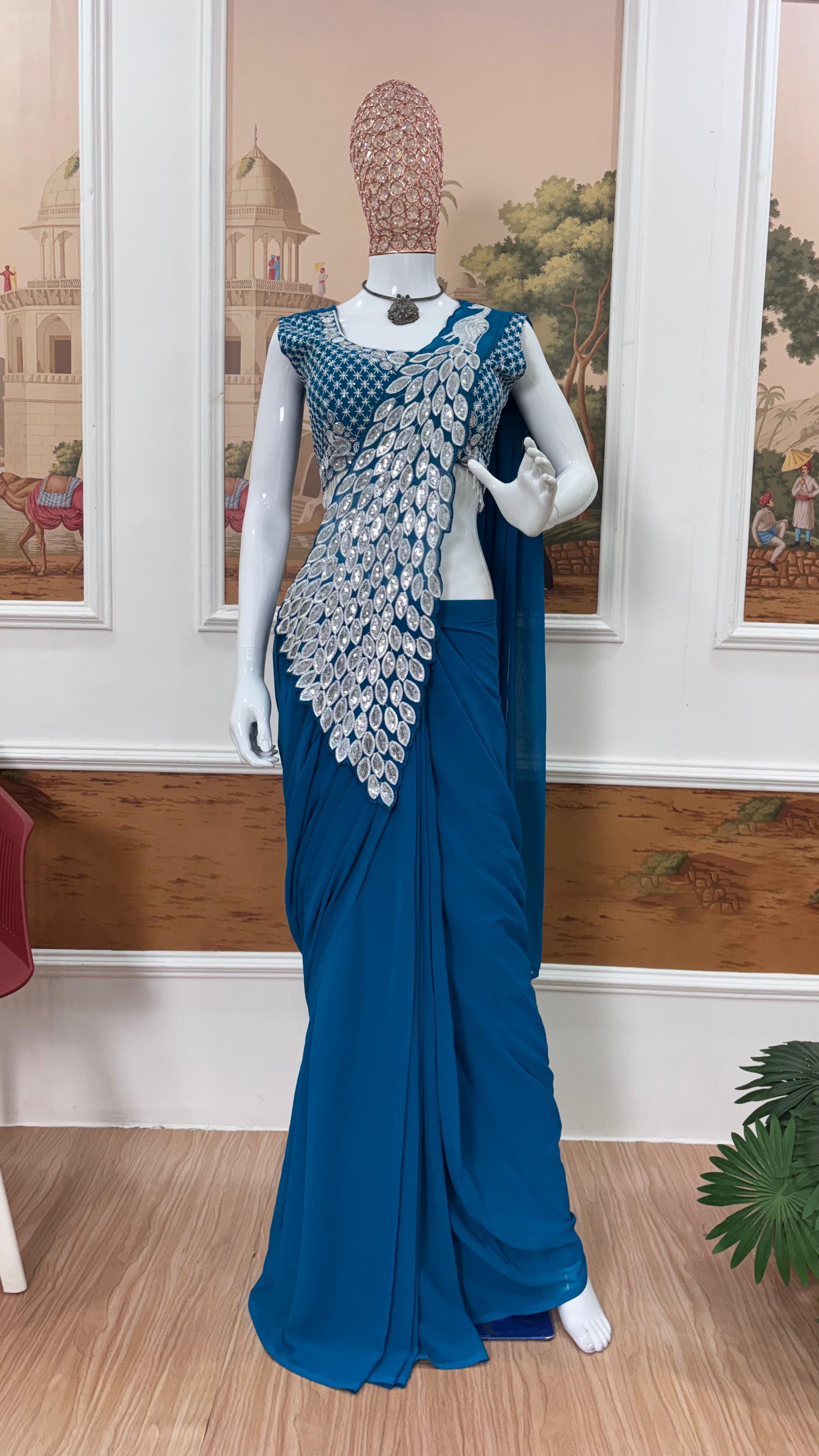 Blue faux georgette ready to wear saree with heavy embroidery front view - WishTown Fashion Club