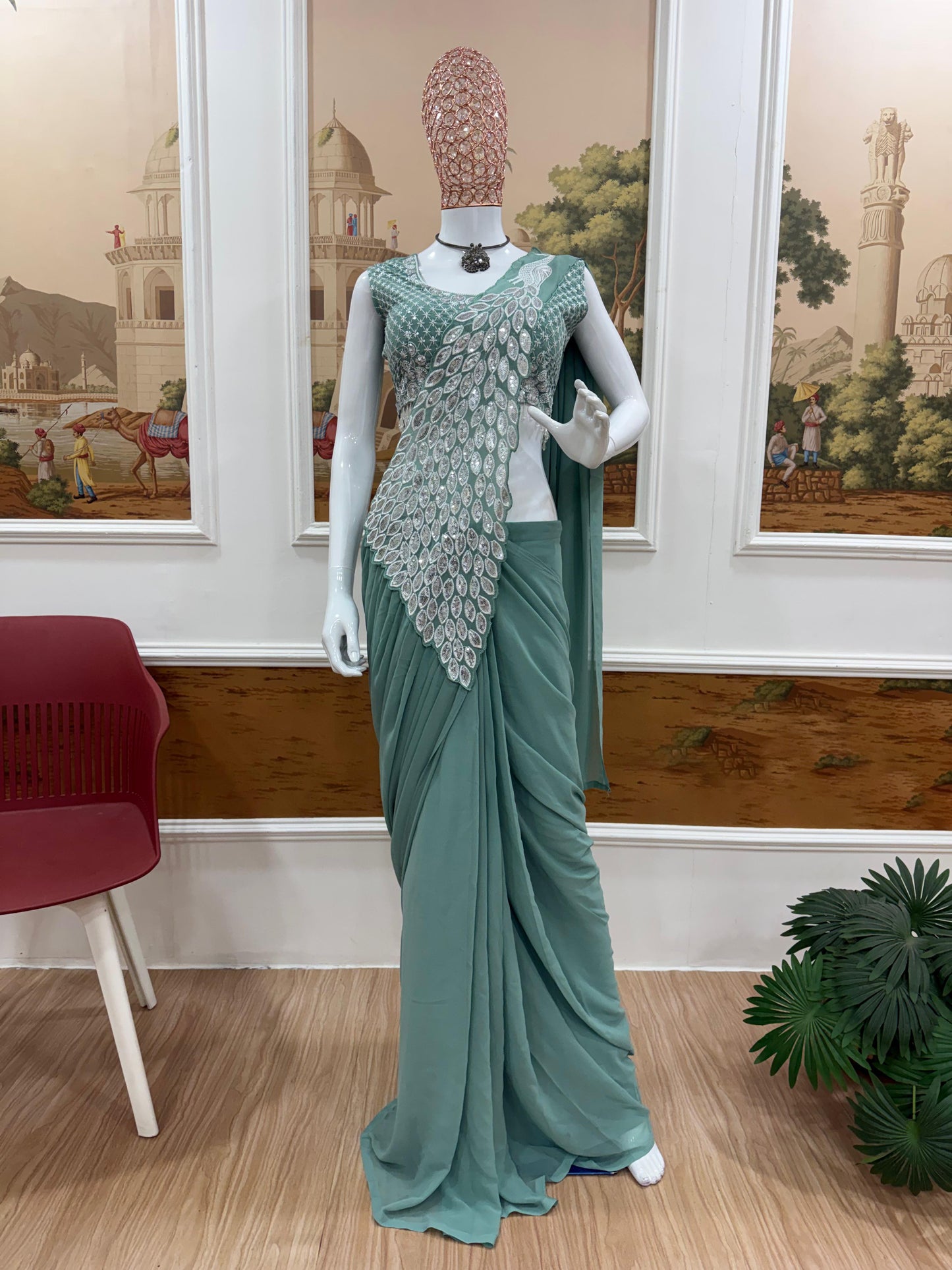 Pista green festive party wear saree detailing close up - WishTown Fashion Club