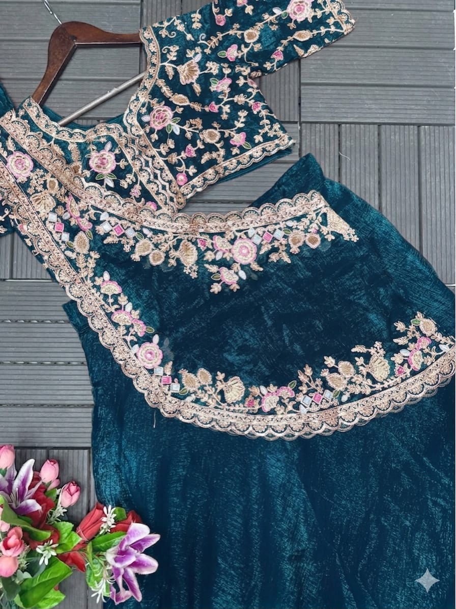 Teal blue designer Crunshi lehenga with 3.5 meter flair and embroidered blouse - WishTown Fashion Club