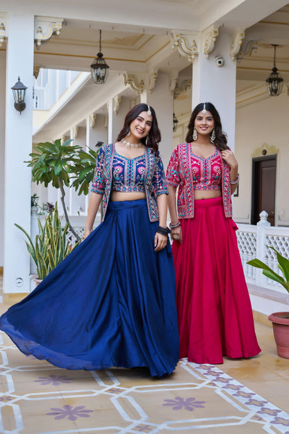Twirl shot showing the full eight point fifty meter flare of a rich navy blue festive skirt. Full presentation of a hot rani pink cultural dress highlighting the attached canvas flare details.