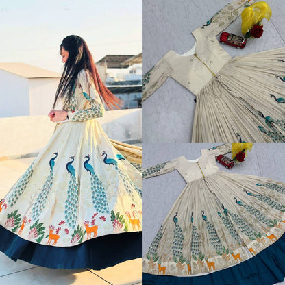 Flat layout presentation of a peacock blue traditional crop top jacket paired alongside a structured canvas layered vichitra silk skirt.