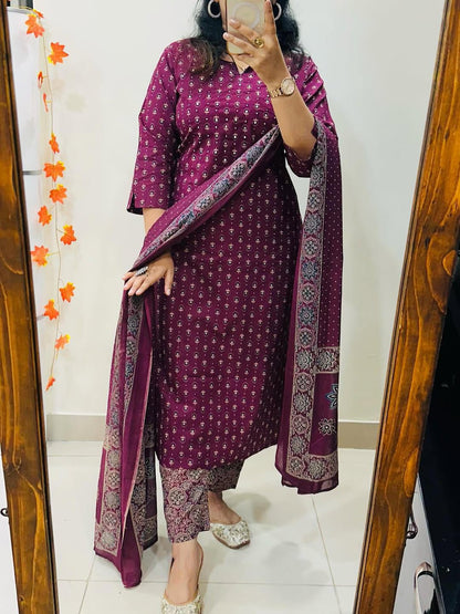 Side angle view of a wine color traditional ensemble showcasing the lightweight drape of premium mul mul fabric.