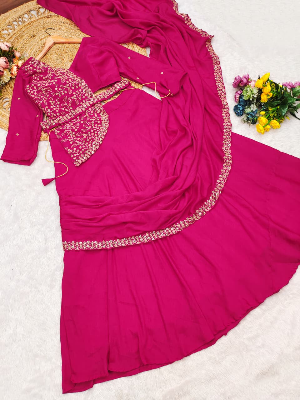 Back angle presentation of a fully stitched rani pink festive ensemble showing clean tailoring lines and a comfortable micro cotton inner lining.