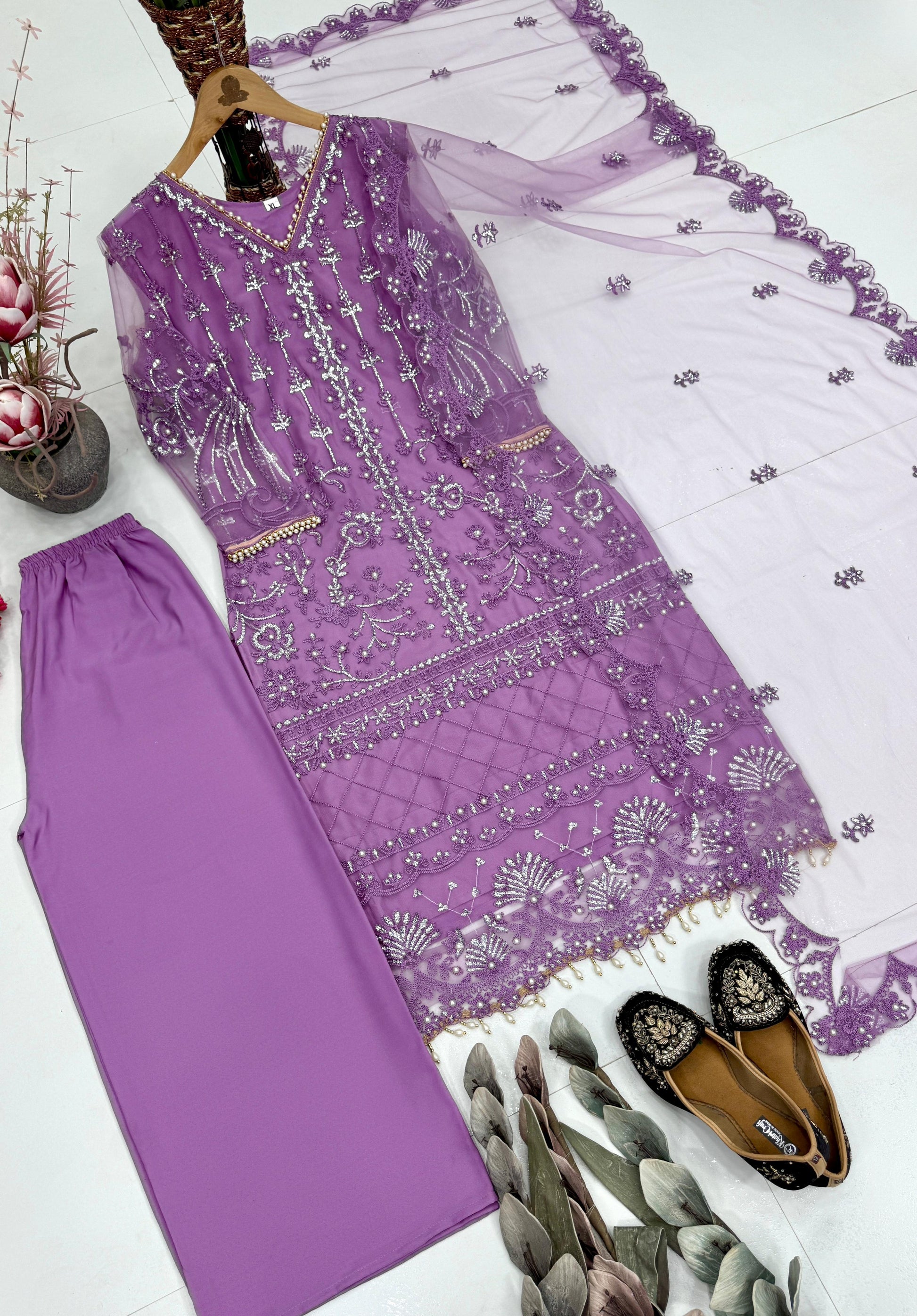 Elegant purple sheer dupatta with geometric chine sequence work and finished edges displayed clearly on a flat surface.