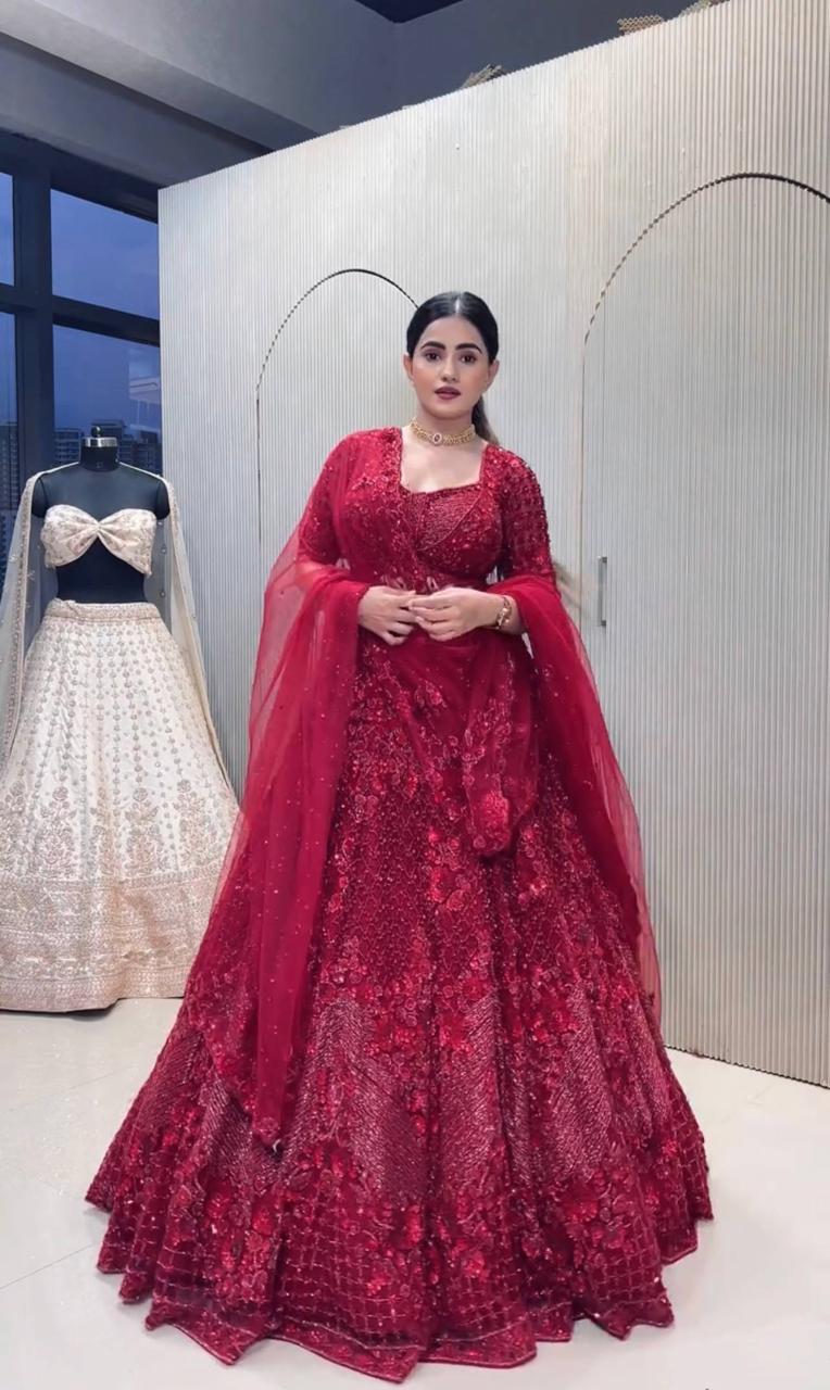 Side profile view of dark pink net lehenga showing graceful drape and three point five meter flair circumference - WishTown Fashion Club