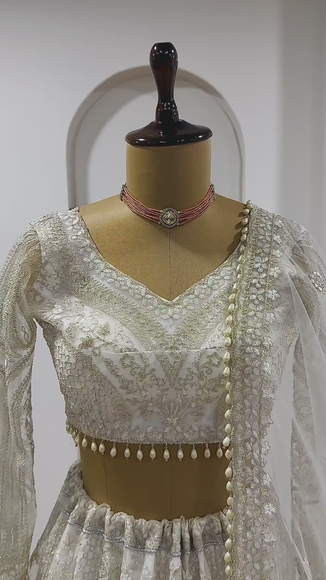 White net lehenga set showcasing full flare movement and embroidery video - WishTown Fashion Club