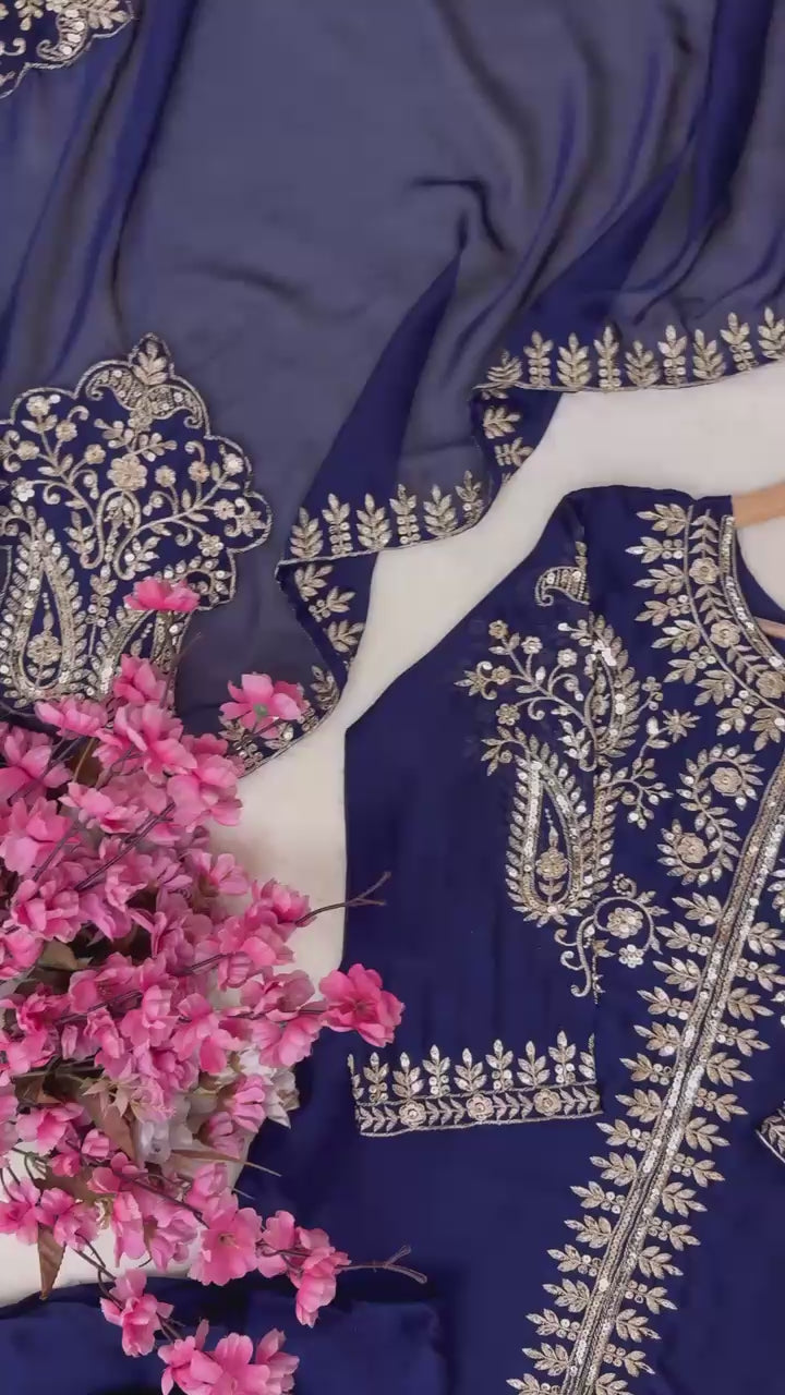 High definition retail display video highlighting the brilliant sparkle of five millimeter sequins and the fluid movement of the navy blue silk fabric.