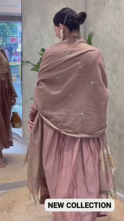 High definition retail display video showcasing the royal movement of the anarkali flare and the rich texture of the woven Banarasi jacquard fabric during a slow rotation.