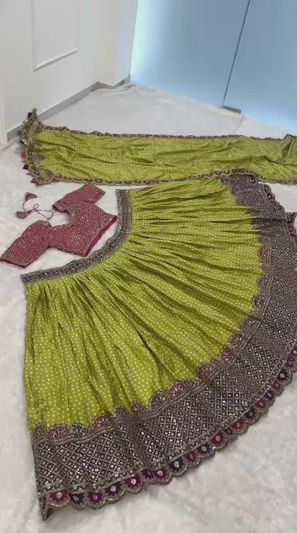 High definition retail showcase video displaying sequins shine and three point five meter flair twirl of olive green lehenga - WishTown Fashion Club