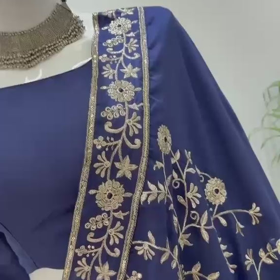 High definition retail showcase video displaying mirror shine and seven meter flare twirl of navy rayon lehenga - WishTown Fashion Club