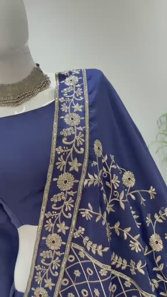 High definition retail showcase video displaying mirror shine and seven meter flare twirl of navy rayon lehenga - WishTown Fashion Club
