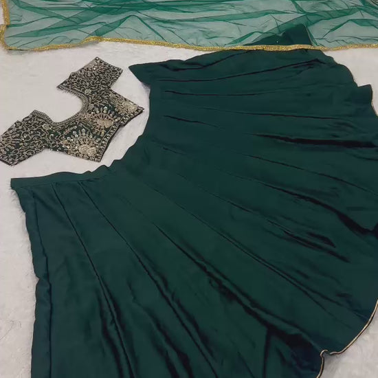 Elegant green satin lehenga with 4.5 meter flair and net dupatta with border embellishment – WishTown Fashion Club