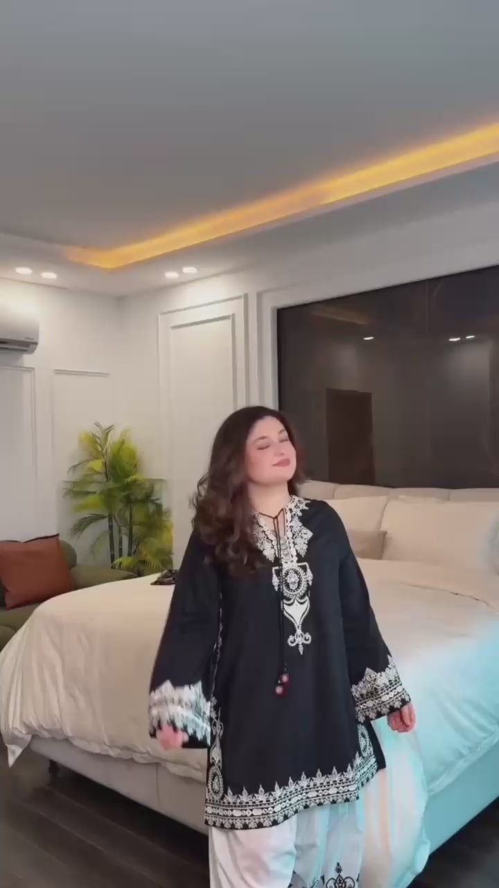 Studio product demonstration video highlighting the full coverage sleeve pattern and the effortless fluid drape of the digital print dupatta under warm lights.
