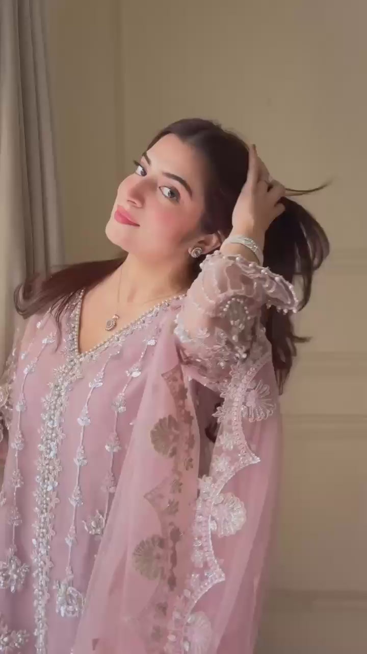 Product demonstration video highlighting the smooth movement of the soft net material and the premium shine of dusty rose embroidery under lights.